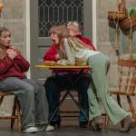 Sequim Gazette photo by Emily Matthiessen
During a recent non-dress rehearsal, actors Tilly Woods as Cinderella, left, and Rain Nelson as stepsister Druzella have a passionate discussion in the kitchen as the cook, Richard Stephens, takes a snooze in OTAs upcoming Panto Cinderella and the Enabling Habit.