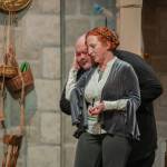 Sequim Gazette photo by Emily Matthiessen
Susan Cates as the evil stepmother Lady Tremayne strokes her cat Lucifur, played by Mario Arruda, in OTAs upcoming Panto, Cinderella and the Enabling Habit.