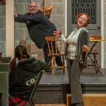 Sequim Gazette photo by Emily Matthiessen
Susan Cates gives full rein to evil delight as Cinderellas evil stepmother. Her cat Lucifur, played by Mario Arruda, looks on from OTAs Gathering Hall stage. The Panto Cinderella and the Enabling Habit will be performed with audience participation.