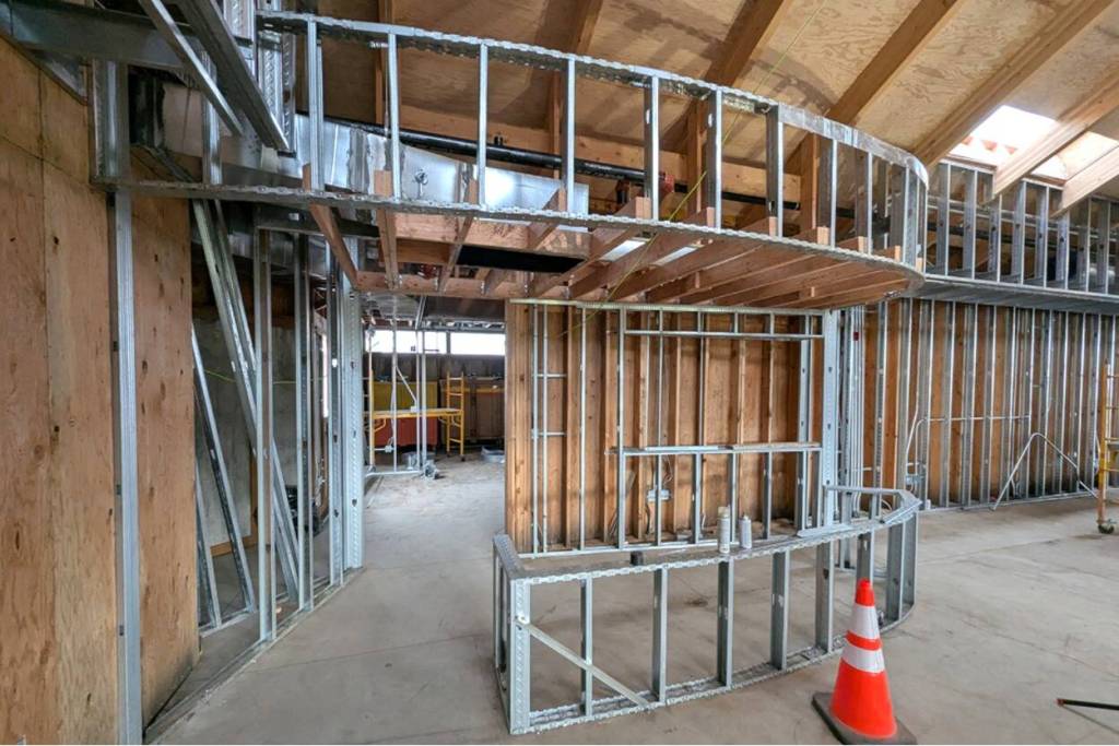 Photo courtesy NOLS/ Work continues on the many new elements of the Sequim Library, including a front circulation desk, pictured, and various dedicated areas, such as a childrens area.