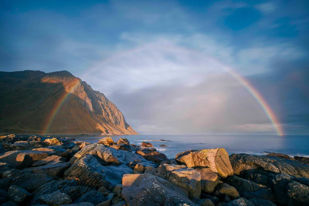 Photo by Belinda Shi
Belinda Shi and her family watch the sunrise at Stornappstinden in Norway.