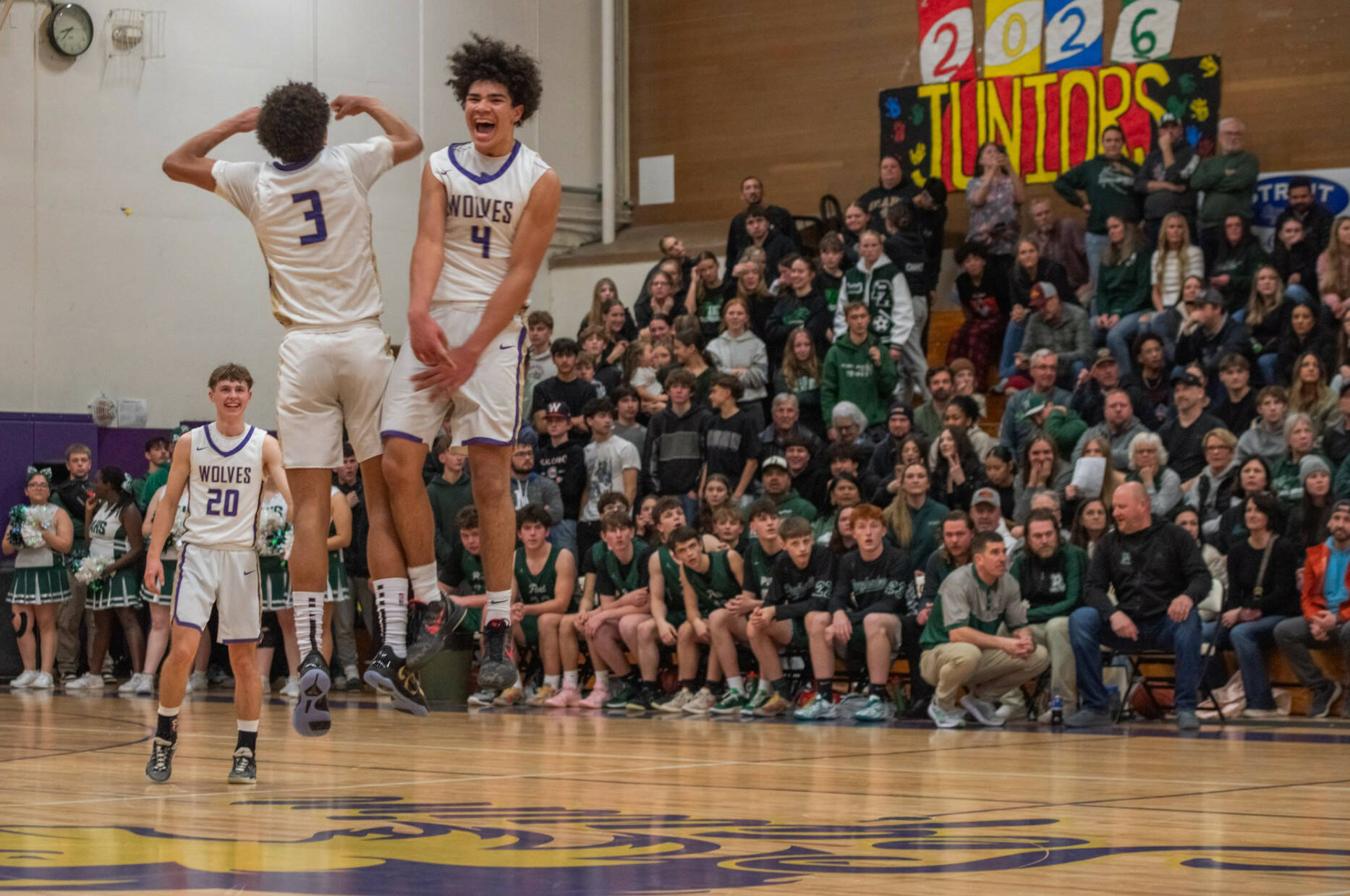 Sequim Gazette photos by Emily Matthiessen
Sequims Jericho Julmist, right, and Solomon Sheppard celebrate the Wolves come-from-behind victory over rival Port Angeles on Jan. 31.