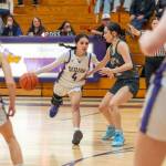 Sequim Gazette photo by Emily Matthiessen/ Gracie Chartraw looks for teammates during a play against North Kitsap on Feb. 7.