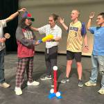 In Sequimderella: A Sequim Cinderella Story, Oscar (Adrian Dulfo), second from left, tries to fit in with his future family members, from left, Reid Randall as stepbrother Ken, Colin McKenzie as coach/step-dad, Jack Crecelius as stepbrother Zach, and Ian Baylon as stepbrother Troy.