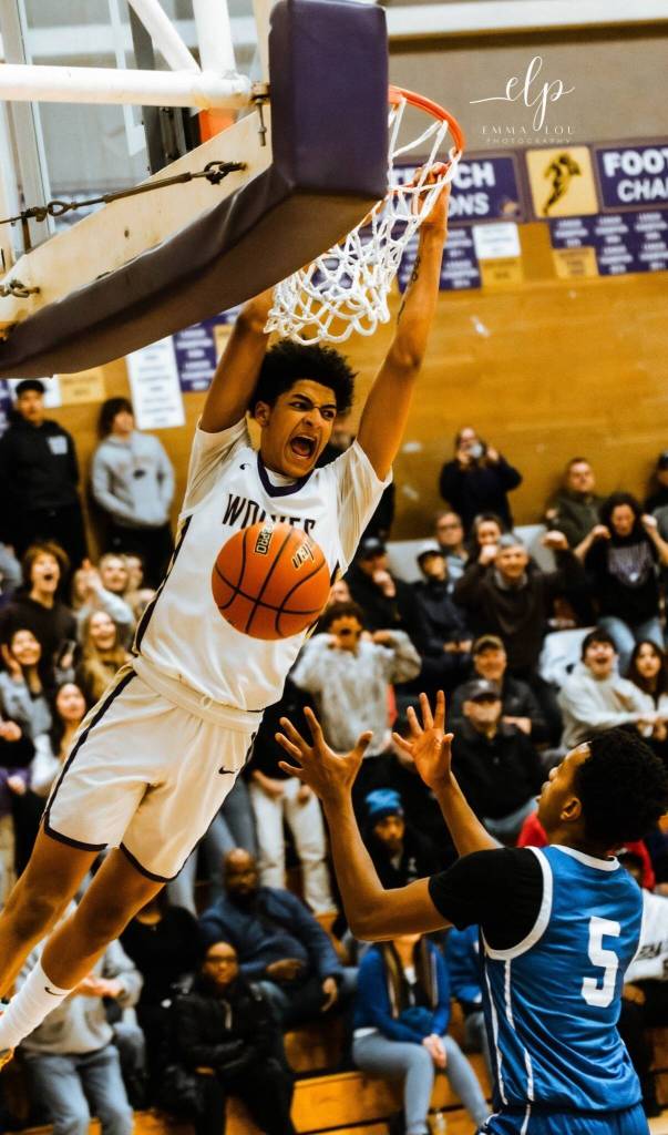 Photo courtesy Emma Lou Photography (<a href="https://emmallouphotography.mypixieset.com" target="_blank">emmallouphotography.mypixieset.com</a>)/ Solomon Sheppard celebrates after making a dunk over Bremerton players on Feb. 10 in a 66-61 win.