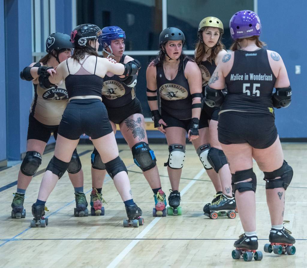 Sequim Gazette photo by Emily Matthiessen/ Port Scandalous Roller Derby league skaters practice to hone skills for the upcoming bout against the Bellingham Roller Betties on Feb. 22 at the Sequim Boys and Girls Club.