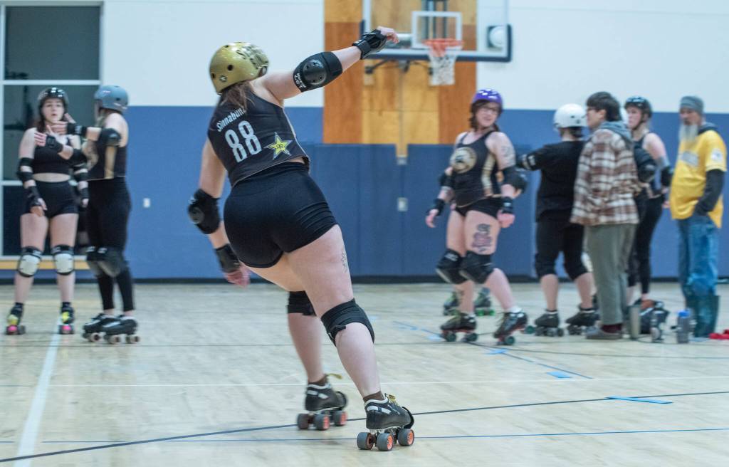 Sequim Gazette photo by Emily Matthiessen/ A member of Port Scandalous Roller Derby, Brittney Vincent, aka Sinnabunz, practices an offensive move at the Port Angeles Boys and Girls club