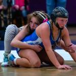 Sequim Gazette file photo by Emily Matthiessen/ Bailey Stein, pictured on left in January, won her 120-pound weight class at the Olympic League tournament to earn a spot at the Mat Classic state tournament in the Tacoma Dome.