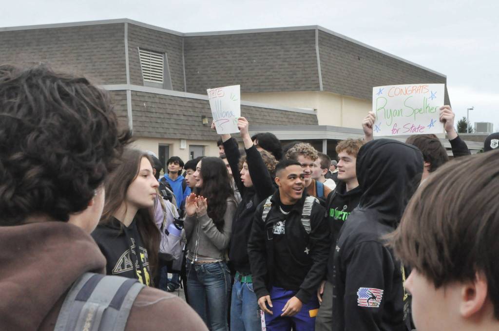 Sequim Gazette photo by Matthew Nash/ Students, staff and families celebrate Sequims wrestlers on Feb. 20 going to the 2A state tournament in the Tacoma Dome.