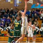 Sequim Gazette photo by Emily Matthiessen/ Zeke Schmadeke goes up for a layup against Foss on Feb. 19.