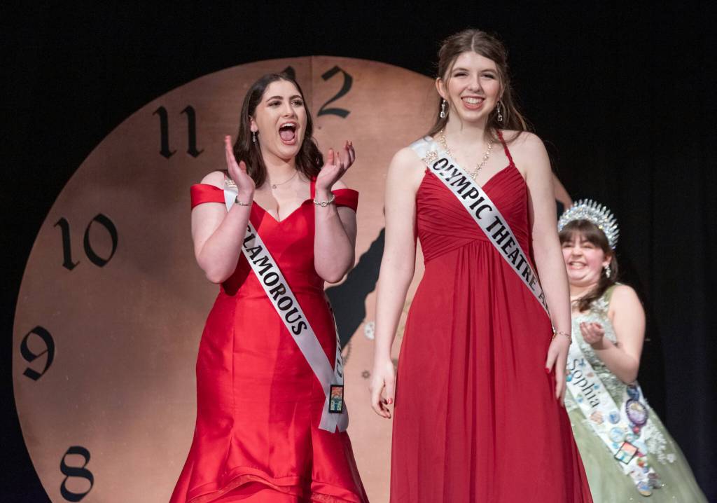 Sequim Gazette photo by Emily Matthiessen/ Glenna Cary cheers Lily Tjemsland who comes forward upon hearing she will be 2025s queen at the Sequim Irrigation Festivals scholarship pageant.