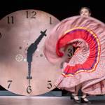 Sequim Gazette photo by Emily Matthiessen/ Scholarship pageant contestant Joanna Morales performs a foklorico dance before the steampunk set featuring a clock set to 1:30 to symbolize the 13 decades of Sequims Irrigation festival.