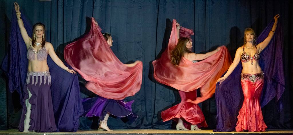 Sequim Gazette photo by Emily Matthiessen
Belly dance troupe Shula Azhar - from left, Marie Maxted, Jovi Wilson, Laura Samperi-Ferdig and Denise Williamson - perform for a full house at Studio Bob on Feb. 21.