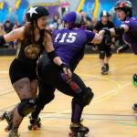 Courtesy of Angelina Morales Photography/ Brittany Vincent, aka Sinna Bunz, plays hard in the Feb. 21 opening bout of the Port Scandalous Scandals versus Bellingham Roller Betties Tough Love in a game that ended in a Tough Love win.