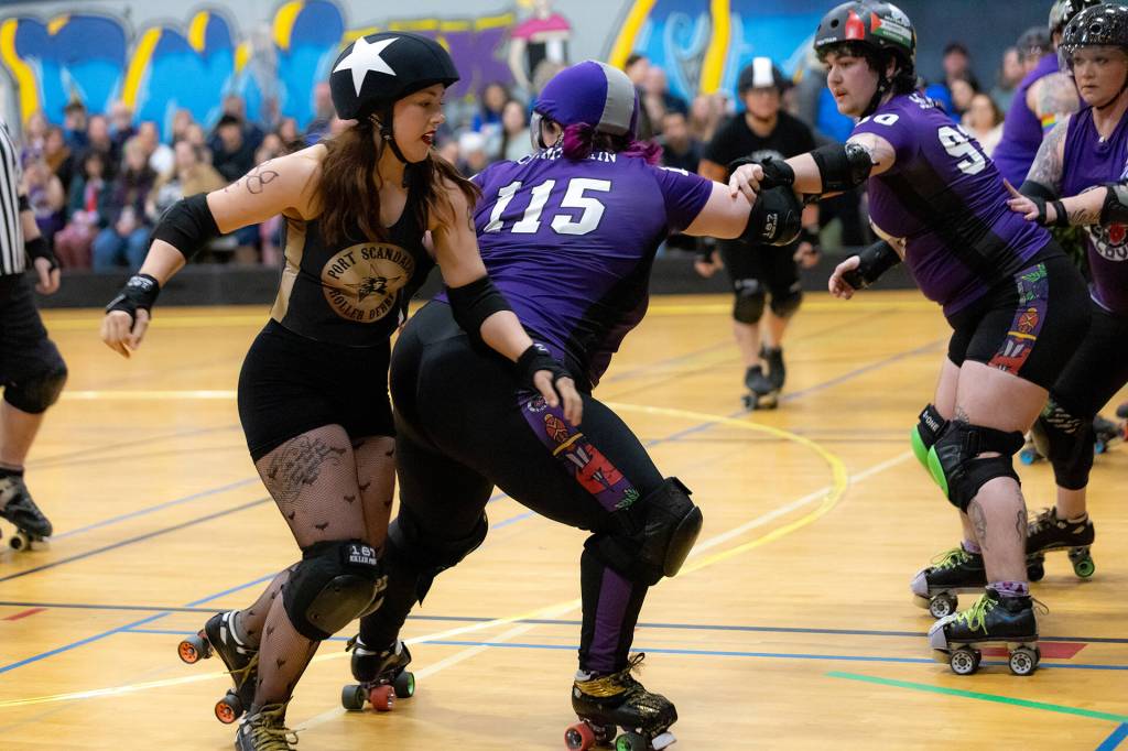 Courtesy of Angelina Morales Photography/ Brittany Vincent, aka Sinna Bunz, plays hard in the Feb. 21 opening bout of the Port Scandalous Scandals versus Bellingham Roller Betties Tough Love in a game that ended in a Tough Love win.