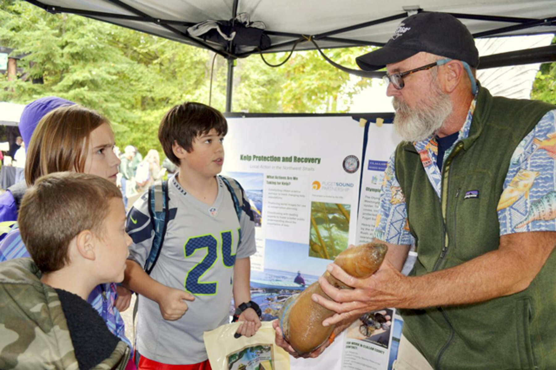 Sequim Gazette file photo by Matthew Nash
Alan Clark speaks to grade school students about Clallam County Marine Resources Committee projects at the Dungeness River Festival.