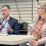 Photo by Paula Hunt| Olympic Medical Center CEO Darryl Wolfe, left, and board President Ann Henninger present information and answer questions about the hospital’s exploration of a possible partnership with another health care system at a forum held by the Clallam County Democrats. Aligning with another organization could help address OMC’s financial challenges and meet community care needs, Wolfe said.