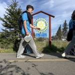 Photo by John Pehrson/ Along the Olympic Discovery Trail, 40 Sequim High School students walked with jugs and buckets on March 1 in solidarity with people across the globe who must walk long distances for drinking water.