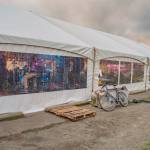 Sequim Gazette photo by Emily Matthiessen/ As is tradition, the sun played peekaboo with the clouds during Sequims Sunshine Festival, seen here outside the Entertainment Tent in Carrie Blake park.
