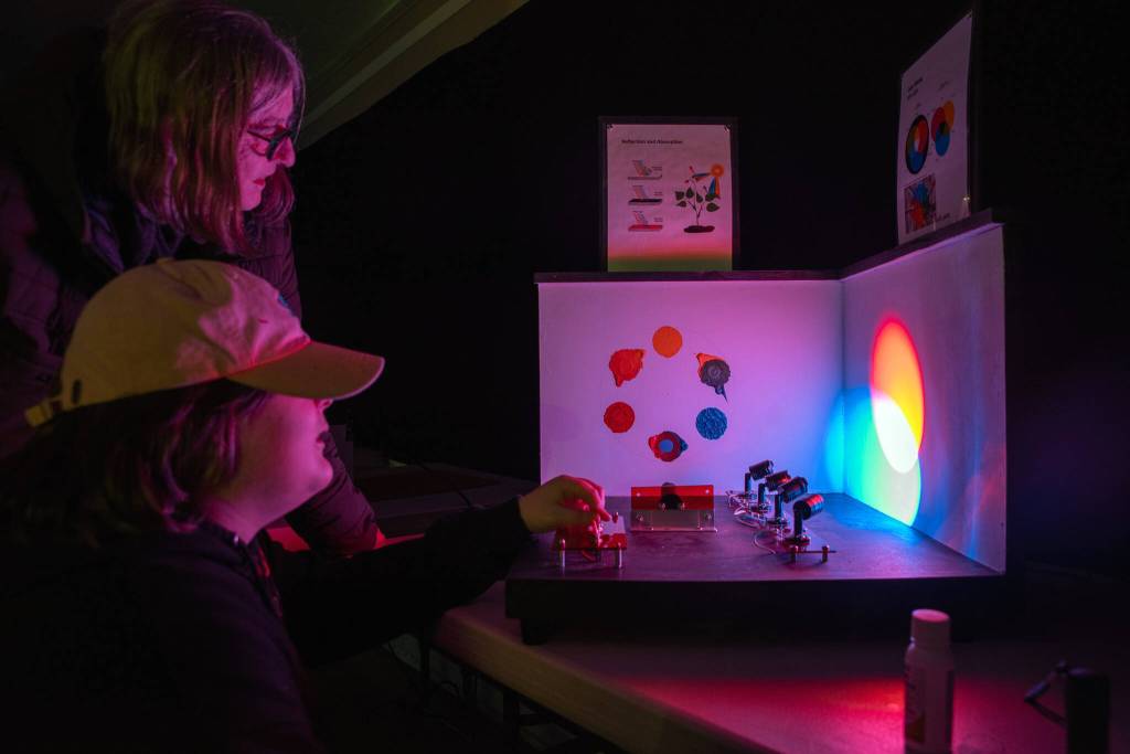 Sequim Gazette photo by Emily Matthiessen/ Designer Ross Browns Interactive Light Experience at the gardent clubhouse in Pioneer Memorial Park was enjoyed by a steady stream of visitors during the Sunshine Festival.