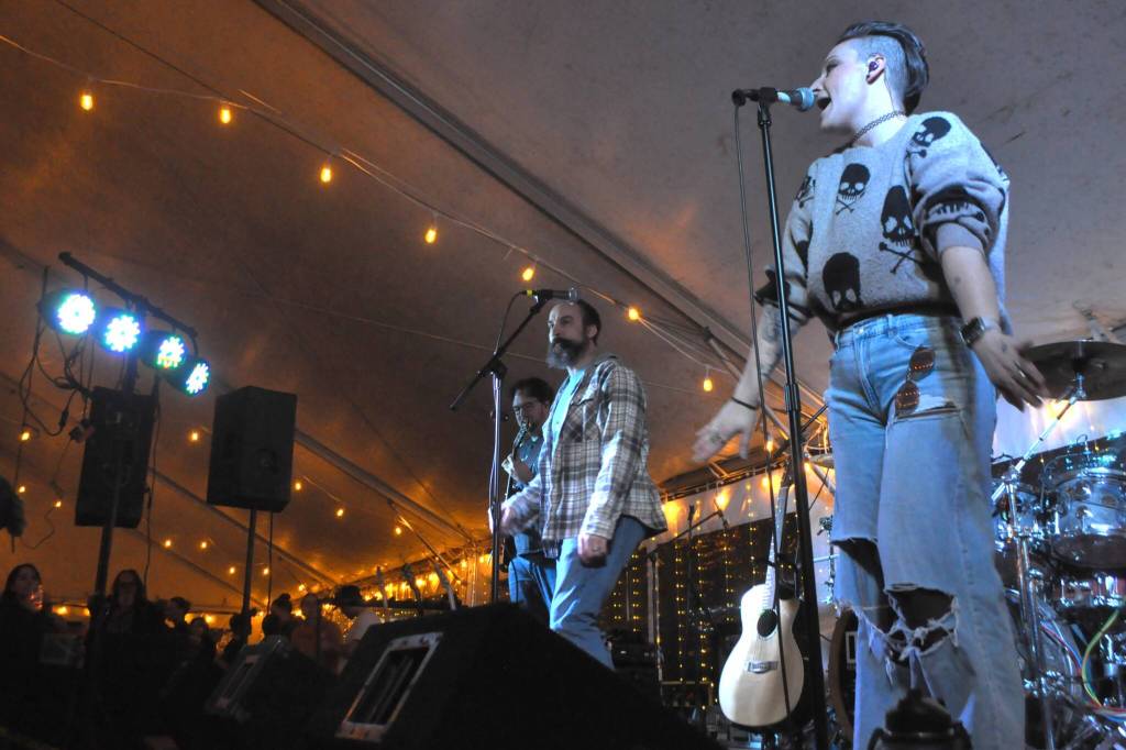 Sequim Gazette photo by Matthew Nash/ Supernostalgic band members, from left, Branden Bettger, Jeremy Pederson and Sadie Sprenger perform a cover of No Doubts Im just a girl during the Sequim Sunshine Festival. Also performing with the band were Adam Bettger and Michael Echternkamp.