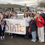 Photo courtesy Port Angeles/Sequim Gymnastics Team/ Friends and family celebrate Lucy Spelker, front left, going to the 1A/2A/3A Gymnastics State Meet in February.