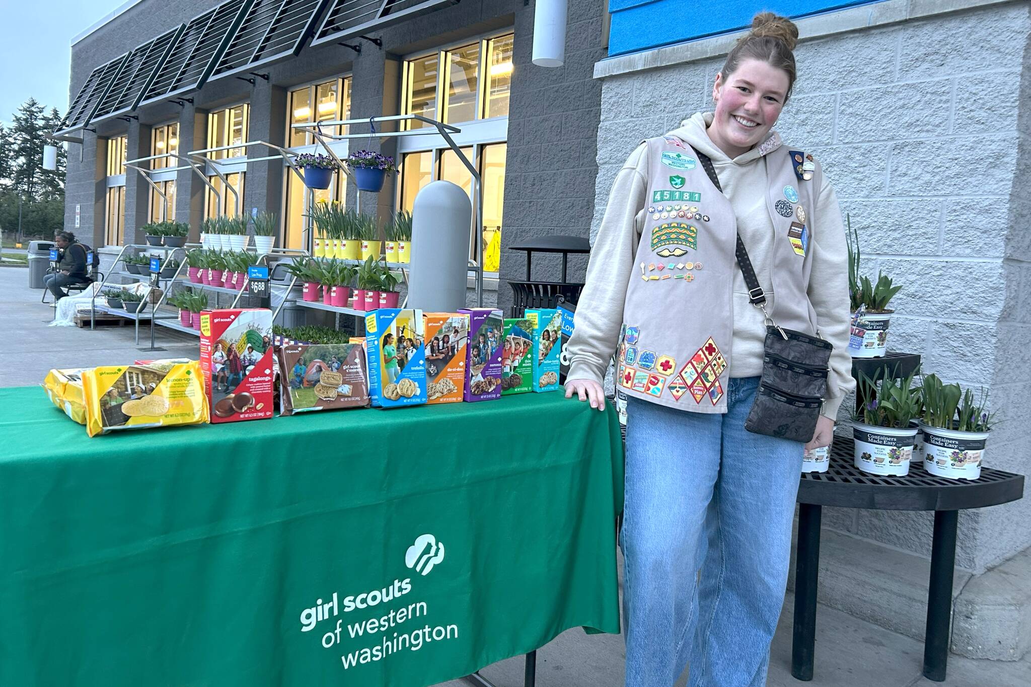 Sequim Gazette photo by Matthew Nash
Skylar Krzyworz stands outside Walmart on March 7th when she hit the milestone of selling her 25,000th box of Girl Scout cookies. Girl Scouts has been something that I never realized was going to have such a big impact on me, she said. And then after being in it for 13 years, I dont know what I would do without it in my life.