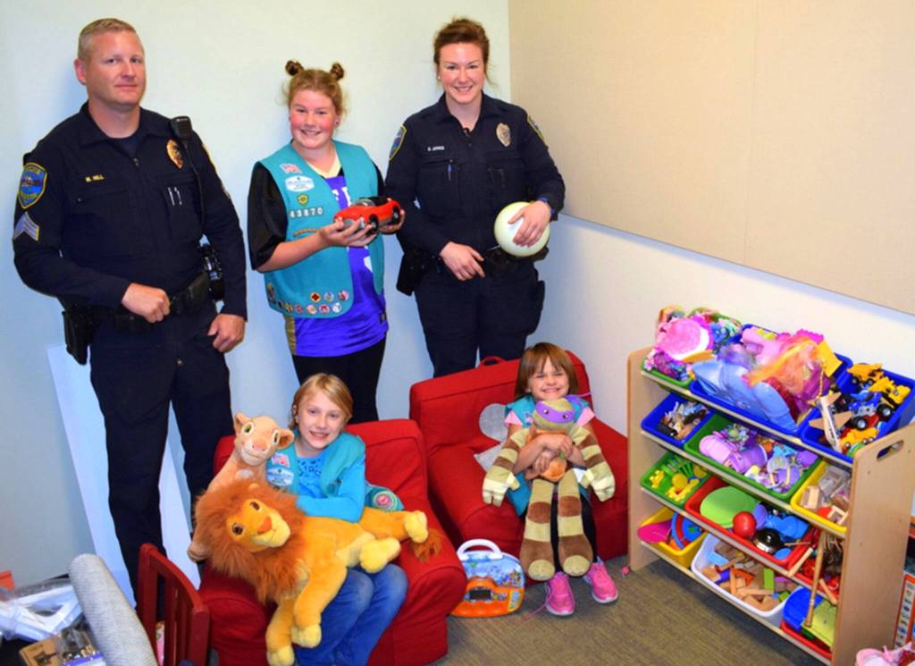 Photo courtesy of Heidi Krzyworz/ Through her years in Girl Scouts, Skylar Krzyworz, top center, has helped with many projects around Sequim, including in 2017 when her Troop helped plan, fundraise and decorate a waiting room in the Sequim Civic Center for children at the Sequim Police Department.