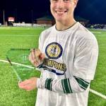 Photo courtesy Henninger Family
Aidan Henninger of Sequim celebrates Franciscan Universitys Presidents Athletic Conference championship last November where he scored the second goal in the 2-1 win to qualify for the NCAA Division III mens soccer championship bracket.