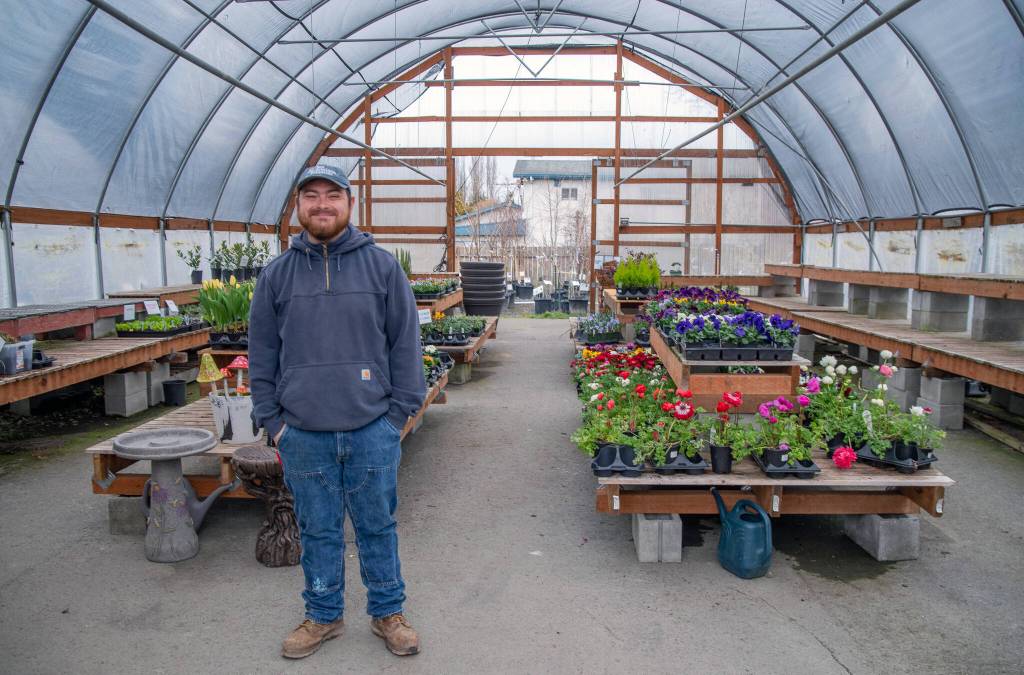 Sequim Gazette photo by Emily Matthiessen/ Stew Cockburn stands in the spring annual section prior to it being for early spring gardeners.
