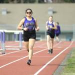 Sequim Gazette photo by Matthew Nash
Sequims Aspen Goldner, left, and Violet Ollerman run the 3200 meters on March 20 at Sequim School Districts track. They were the only competitors in the event, and the second event to go in nearly four years since the district stopped hosting meets due to safety concerns with the track before it was resurfaced last summer.