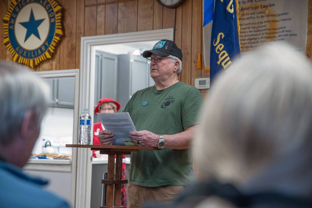 Sequim Gazette photo by Emily Matthiessen/ During Saturday's Vietnam veteran lapel pin ceremony at the American Legion in Sequim, Daniel Abbott shares his story from his time stationed in rural Vietnam with the Combined Action Program, designed to integrate marines with and provide protection for locals. Abbott said it is "a privelage and honor to represent veterans" at the ceremony.