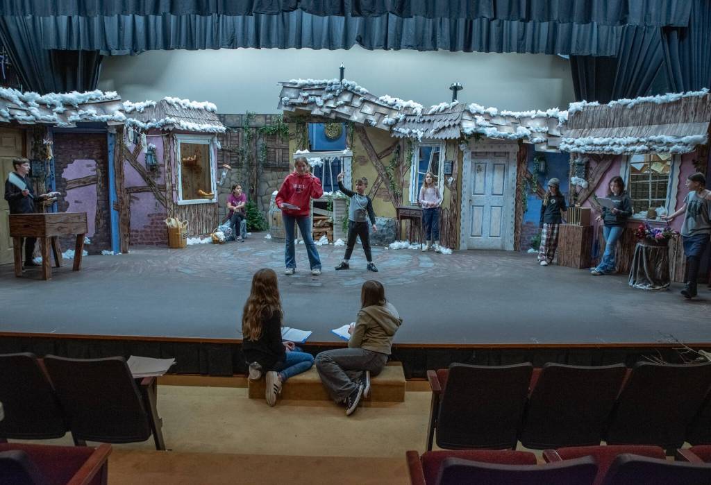 Sequim Gazette photo by Emily Matthiessen/ Student directors oversee a rehearsal of Robbers are Everywhere, one of two folktales centered on stones dramatized by playwright Colleen Neuman during Olympic Theatre Arts spring break camp for young thespians.