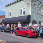 Sequim Gazette photo by Emily Matthiessen/ According to a clicker count by volunteers with Sequim Indivisible, 1298 people turned out by 11:45 a.m., with nearly 1400 people counted by 2:00 p.m. during Sequims version of the Hands Off  protests held across the nation and in other countries on Saturday. The protest was peaceful and orderly, according to police, organizers and protesters and featured a range of protest signs.