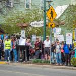 Sequim Gazette photo by Emily Matthiessen/ According to a clicker count by volunteers with Sequim Indivisible, 1298 people turned out by 11:45 a.m., with nearly 1400 people counted by 2:00 p.m. during Sequims version of the Hands Off  protests held across the nation and in other countries on Saturday. The protest was peaceful and orderly, according to police, organizers and protesters and featured a range of protest signs.