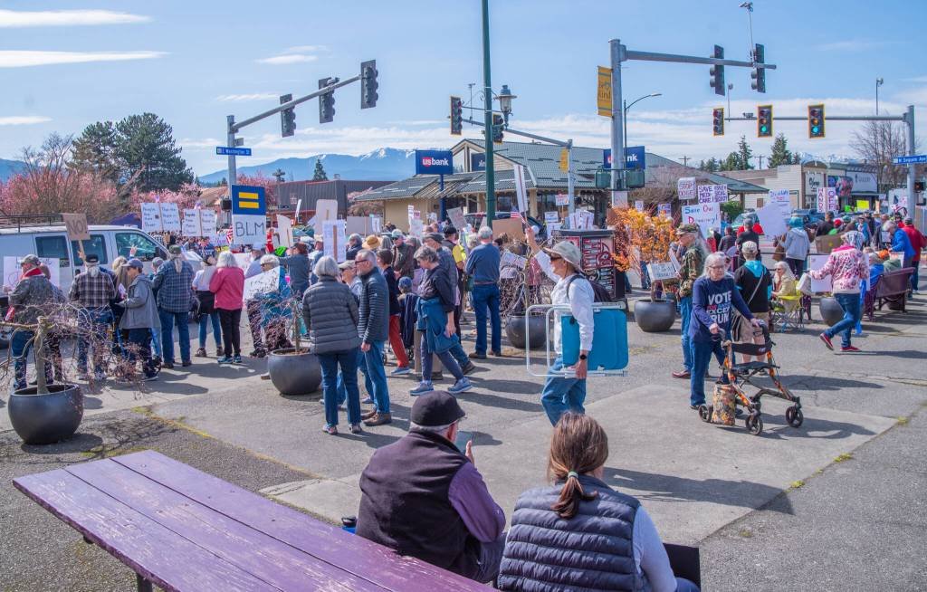 Sequim Gazette photo by Emily Matthiessen/ According to a clicker count by volunteers with Sequim Indivisible, 1298 people turned out by 11:45 a.m., with nearly 1400 people counted by 2:00 p.m. during Sequim's version of the "Hands Off " protests held across the nation and in other countries on Saturday. The protest was peaceful and orderly, according to police, organizers and protesters and featured a range of protest signs.