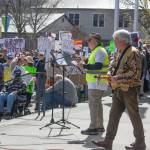 Sequim Gazette photo by Emily Matthiessen/ According to a clicker count by volunteers with Sequim Indivisible, 1298 people turned out by 11:45 a.m., with nearly 1400 people counted by 2:00 p.m. during Sequims version of the Hands Off  protests held across the nation and in other countries on Saturday. The protest was peaceful and orderly, according to police, organizers and protesters and featured a range of protest signs.