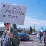 Sequim Gazette photo by Emily Matthiessen/ According to a clicker count by volunteers with Sequim Indivisible, 1298 people turned out by 11:45 a.m., with nearly 1400 people counted by 2:00 p.m. during Sequim's version of the "Hands Off " protests held across the nation and in other countries on Saturday. The protest was peaceful and orderly, according to police, organizers and protesters and featured a range of protest signs.
