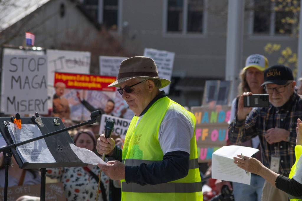 Sequim Gazette photo by Emily Matthiessen/ According to a clicker count by volunteers with Sequim Indivisible, 1298 people turned out by 11:45 a.m., with nearly 1400 people counted by 2:00 p.m. during Sequims version of the Hands Off  protests held across the nation and in other countries on Saturday. The protest was peaceful and orderly, according to police, organizers and protesters and featured a range of protest signs.