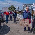 Sequim Gazette photo by Emily Matthiessen/ According to a clicker count by volunteers with Sequim Indivisible, 1298 people turned out by 11:45 a.m., with nearly 1400 people counted by 2:00 p.m. during Sequim's version of the "Hands Off " protests held across the nation and in other countries on Saturday. The protest was peaceful and orderly, according to police, organizers and protesters and featured a range of protest signs.