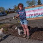 Sequim Gazette photo by Emily Matthiessen/ According to a clicker count by volunteers with Sequim Indivisible, 1298 people turned out by 11:45 a.m., with nearly 1400 people counted by 2:00 p.m. during Sequim's version of the "Hands Off " protests held across the nation and in other countries on Saturday. The protest was peaceful and orderly, according to police, organizers and protesters and featured a range of protest signs.