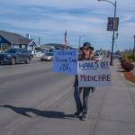 Sequim Gazette photo by Emily Matthiessen/ According to a clicker count by volunteers with Sequim Indivisible, 1298 people turned out by 11:45 a.m., with nearly 1400 people counted by 2:00 p.m. during Sequim's version of the "Hands Off " protests held across the nation and in other countries on Saturday. The protest was peaceful and orderly, according to police, organizers and protesters and featured a range of protest signs.
