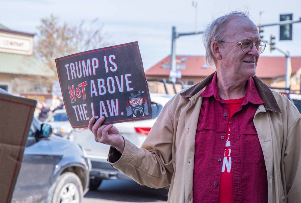 Sequim Gazette photo by Emily Matthiessen/ According to a clicker count by volunteers with Sequim Indivisible, 1298 people turned out by 11:45 a.m., with nearly 1400 people counted by 2:00 p.m. during Sequim's version of the "Hands Off " protests held across the nation and in other countries on Saturday. The protest was peaceful and orderly, according to police, organizers and protesters and featured a range of protest signs.
