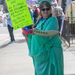 Sequim Gazette photo by Emily Matthiessen/ According to a clicker count by volunteers with Sequim Indivisible, 1298 people turned out by 11:45 a.m., with nearly 1400 people counted by 2:00 p.m. during Sequim's version of the "Hands Off " protests held across the nation and in other countries on Saturday. The protest was peaceful and orderly, according to police, organizers and protesters and featured a range of protest signs.