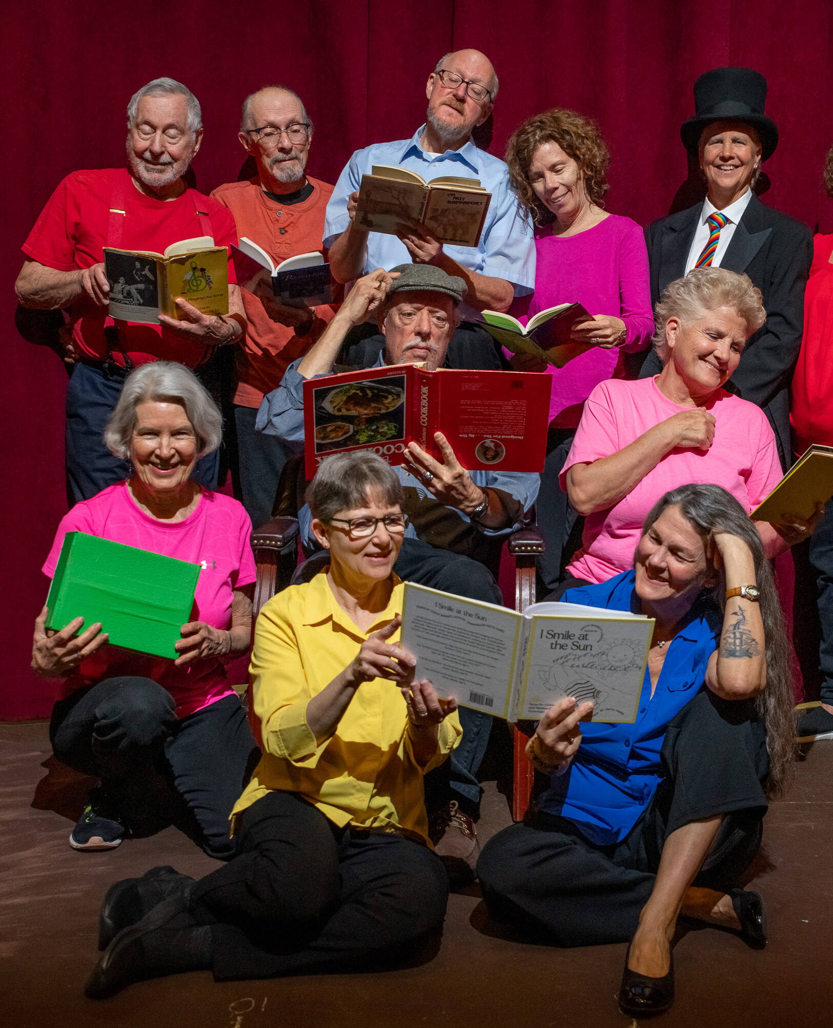 Sequim Gazette photo by Emily Matthiessen
Olympic Theatre Arts Readers Theatre Club will perform writer Judith Barrett Lawsons I Smile at the Sun on April 12 and 13 at 2 p.m. The play was created from a book of poetry written for children and OTA has a special discount code on their website for a free ticket for a child attending with an adult. This will be the clubs second performace and features 14 actors. Pictured here, from left to right, top row to bottom, are actors Merv Wingard, Jim Bradrick, Trent Pomeroy, Mary Daniel, Lori Venneberg Judi Wingard, Carl Honore, Rozlyn Rouse, Diane Smith and Susan Fahlgren.