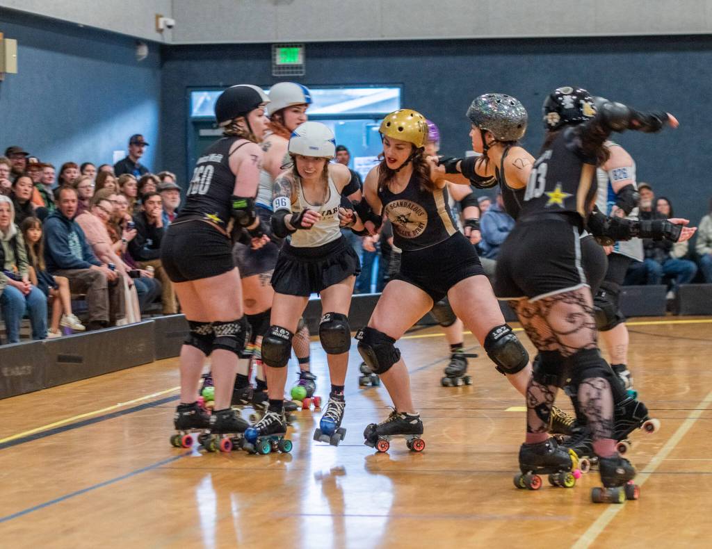 Sequim Gazette photo by Emily Matthiessen/ The Scandals second bout of the season, in Sequim against Tacomas Dockyard Roller Derby team Undertow, resulted in a 158-132 loss.