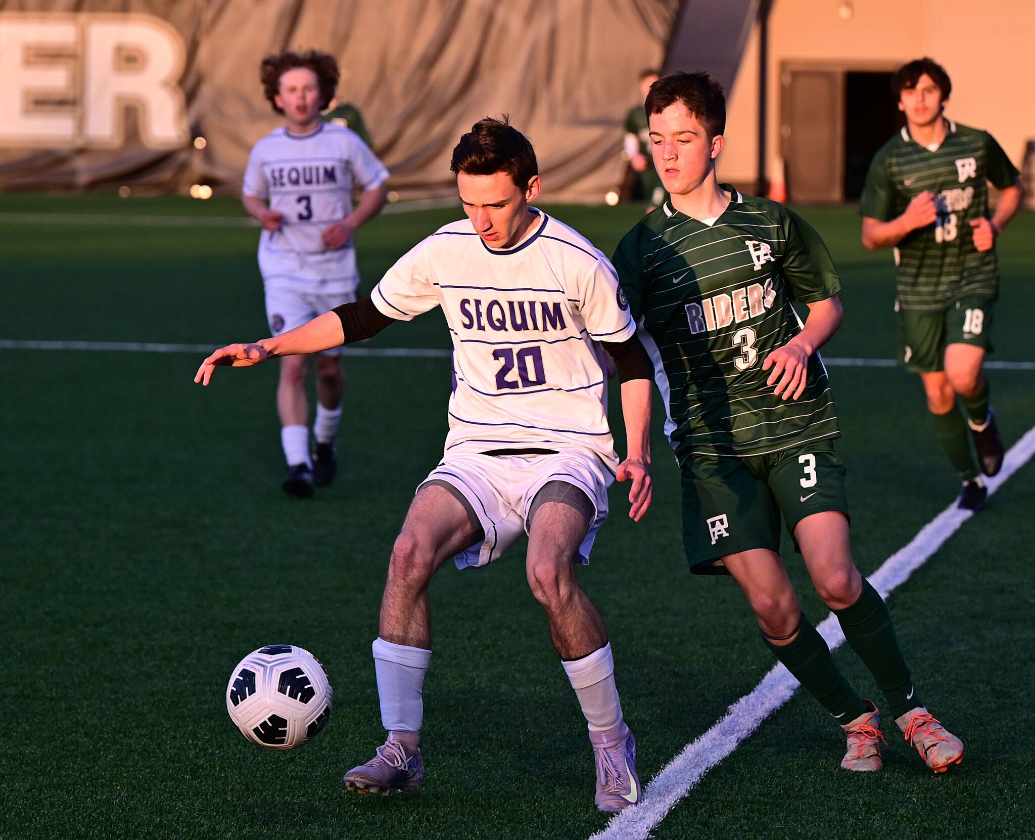 Photo by Jay Cline/ Photo ID forthcoming
Photo by Jay Cline
Sequims Colton Wagner looks to move the ball against the Roughriders in Port Angeles on April 8.