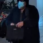 Photo courtesy Sequim Police Department/ On April 10, Sequim Police Department released screenshots of video surveillance of a man who is alleged to have robbed Kitsap Bank in Sequim on April 9. Police describe the Caucasian male as standing about 6 tall with a gray beard and heavy build.