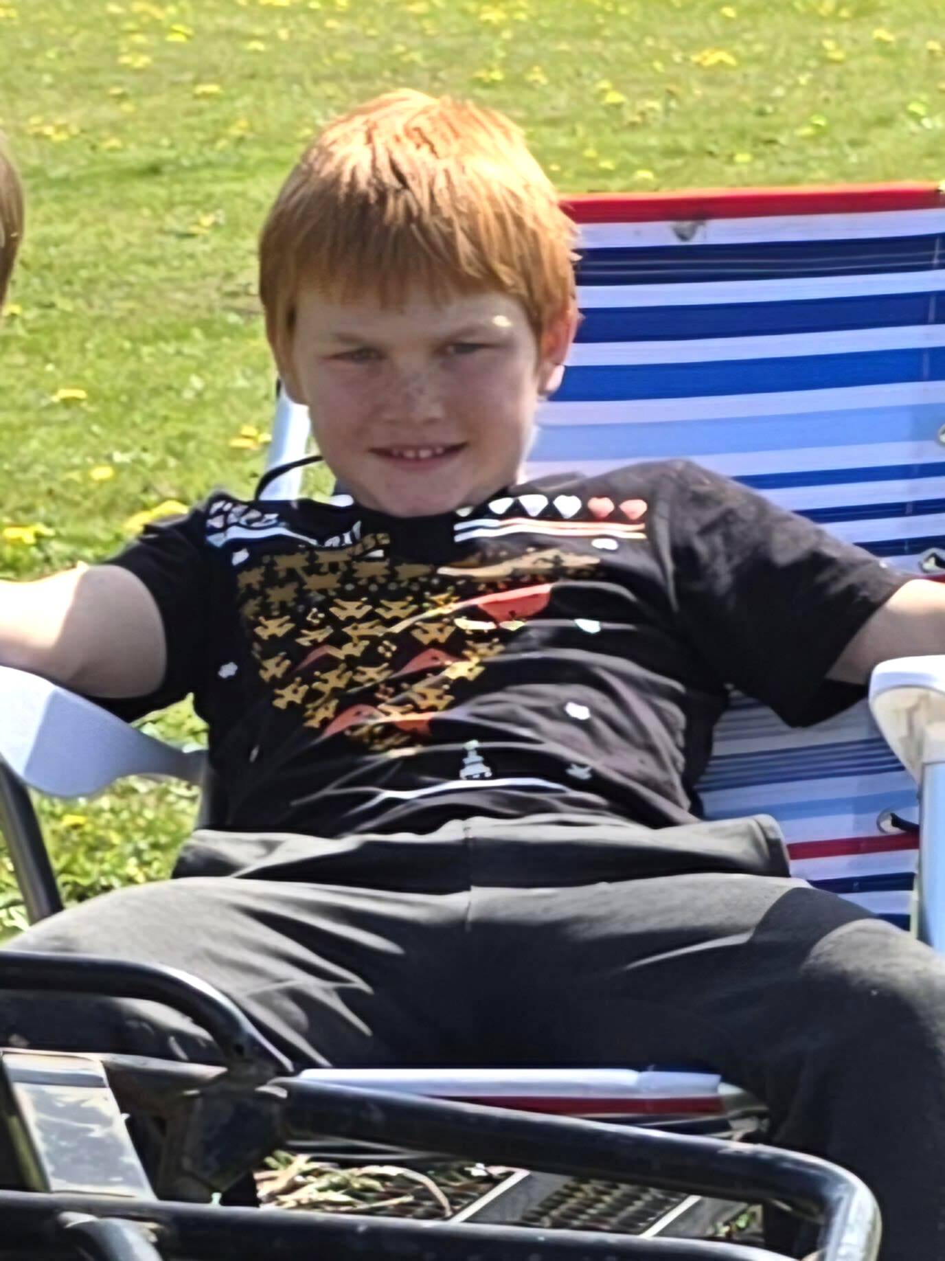 Photo courtesy of Clallam County Sheriffs Office/ Mason Combs, 10, was last seen in the afternoon of April 15 near Blue Mountain Roads woods. He stands about 43 with red hair and was last seen wearing a black pizza shirt and grey pants seen in the provided photo. With information on his whereabouts, call 9-1-1.