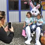 Sequim Gazette photos by Matthew Nash
Tilea Giacalone of Sequim takes a photo of her daughters Bella, 4, and Gia, 2, with the Sequim Elks Lodges Easter bunny on April 19. The bunny was played by new lodge member Scott Shook, organizers said.